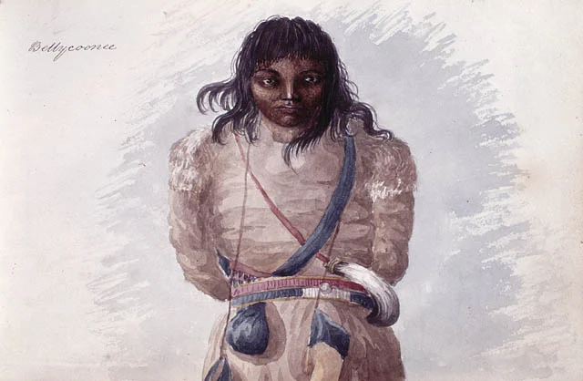 George Back’s painted portrait of Bellycoonee, shown frontally with long dark hair, crossed straps and a belt; the sitter’s name is handwritten at upper left.