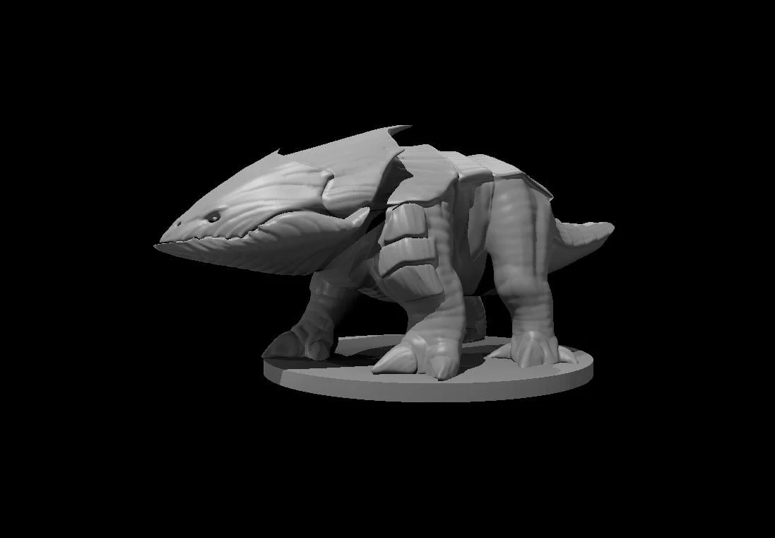 Grey armoured four-legged bulette miniature with wedge-shaped head, broad shoulder plates, dorsal ridge and short tail on an oval base against black.