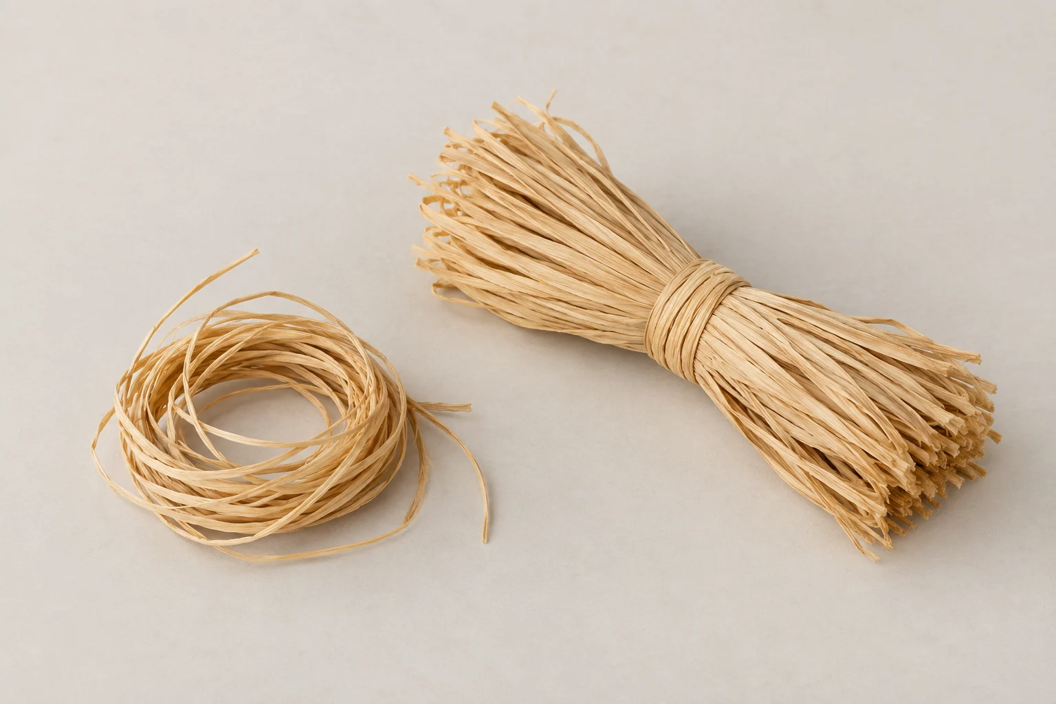 Raffia coil and bound fibre bundle.