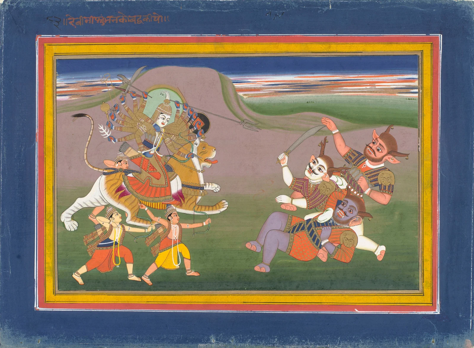 Gold-armoured many-armed goddess on a striped leonine mount attacks three horned demons at right, with three allied figures below; a Hindi inscription and full blue, red and yellow borders surround the scene.