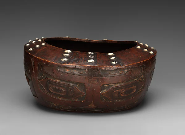 Historical Tlingit wooden bowl with shell inlays around its rim, Met accession 2021.434.5