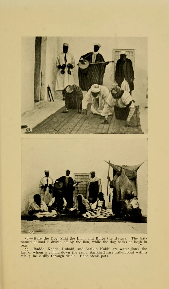A human participant enacts Zaki beside Kare and Bultu in photograph58, 1914