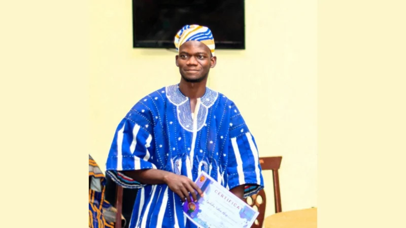 Issahaku Tidoo Abass, a Dagbana teacher and Dagbani Wikimedia contributor from Tamale, holding a certificate in the portrait accompanying his April 2025 interview