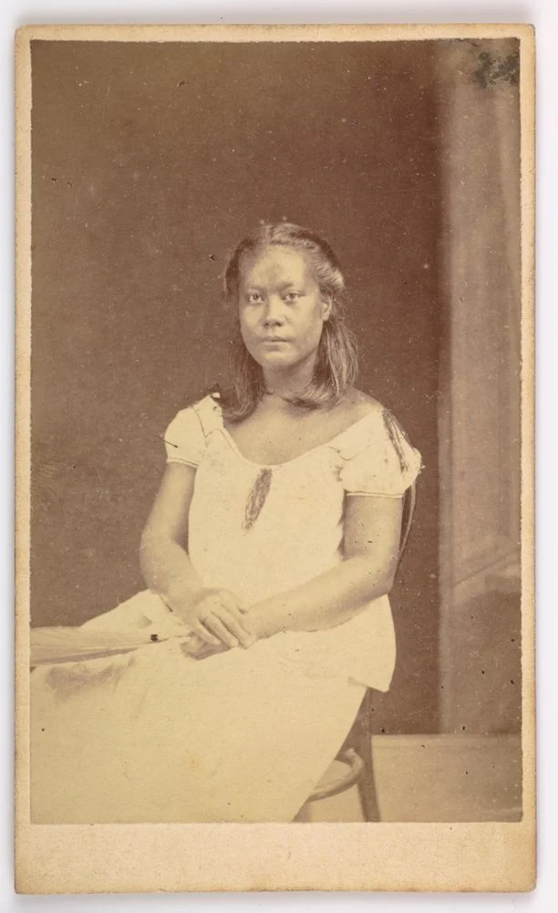 Historical studio portrait catalogued as Girl from Tokelau, Francis Herbert Dufty studio in Fiji, 1871–1886, Te Papa O.043444