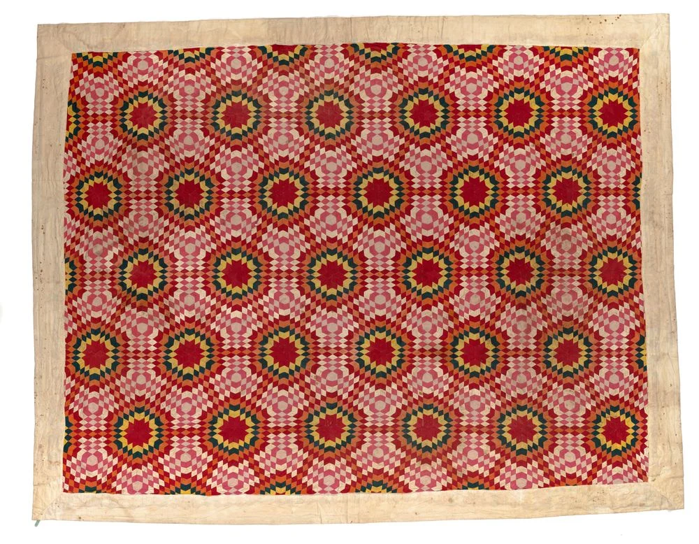 Cook Islands Māori tīvaevae ta’ōrei quilt with hand-sewn coloured diamond patches and white border, circa 1900, Te Papa FE011982