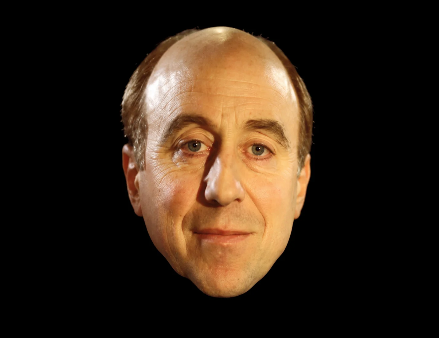 Male floating-head computer display.